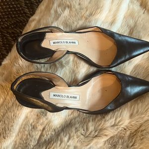 Manolo Blahnik classic black leather slingbacks.